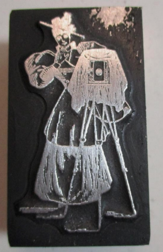 photo of letterpress block described as 'Victorian lady with camera' 