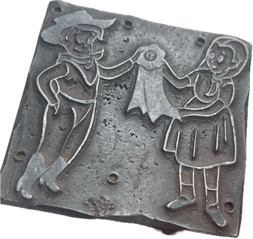 photo of letterpress block described as 'Person in dress & person in cowboy attire awarding each other' 