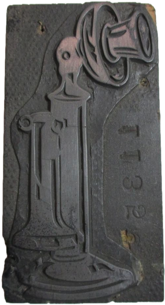 photo of letterpress block described as 'Old telephone' 