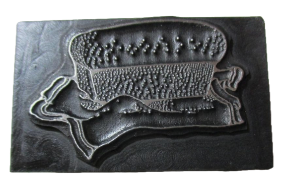 photo of letterpress block described as 'Loaf of bread' 