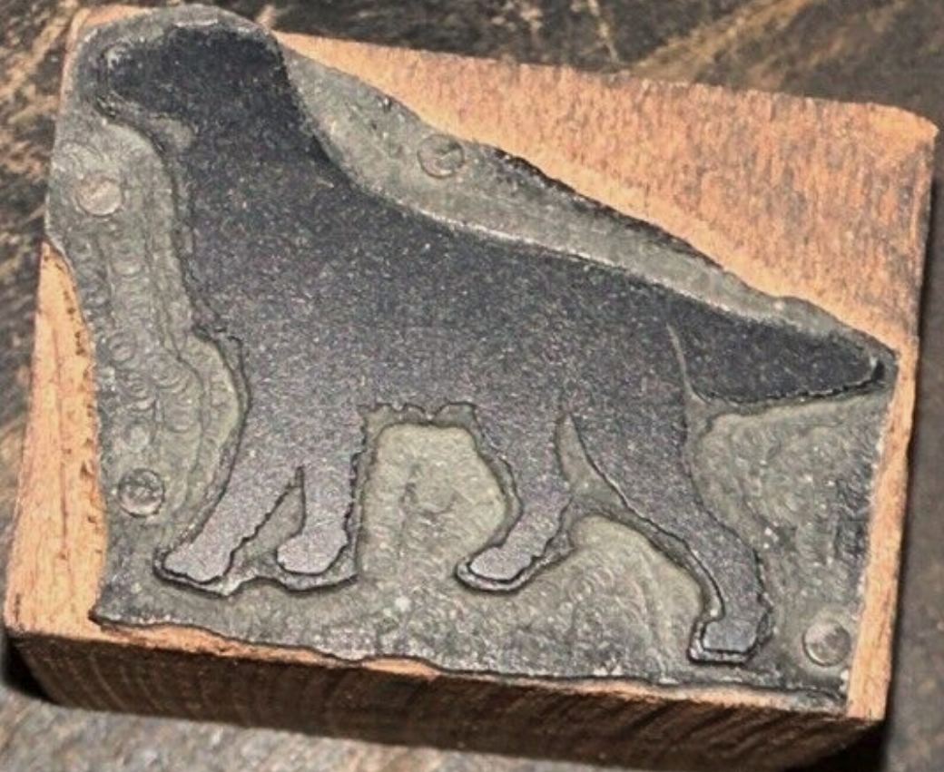 photo of letterpress block described as 'Dog silhouette #1 (upright)' 