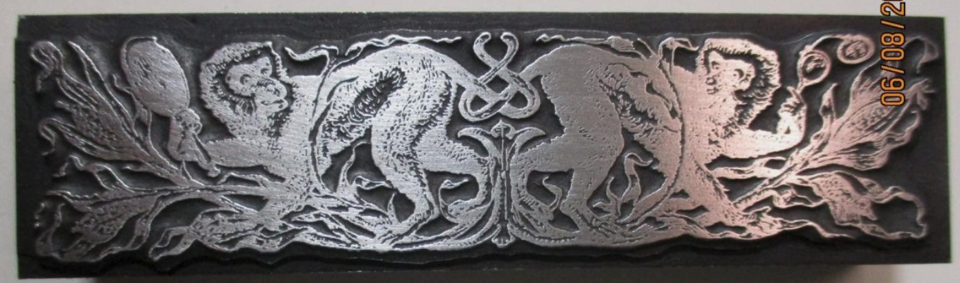 photo of letterpress block described as 'Border with monkeys' 